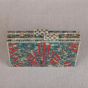 Blue Shells Adorning a Beautiful Wooden Clutch 