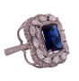 8 gm Silver Ring with an Emerald Cut Sapphire Stone 