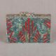 Blue Shells Adorning a Beautiful Wooden Clutch 