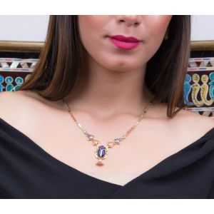 Sophisticated Piece Of Jewelry handmade of 18K Gold in the shape of the Egyptian Scarab and inlaid with Semi-precious stones, Lapis Pendant